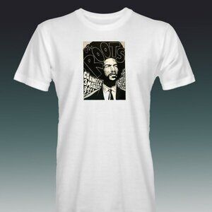 The roots t shirt featuring quest love